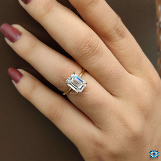 Beautiful moissanite solitaire engagement ring designed with an emerald cut for timeless elegance.