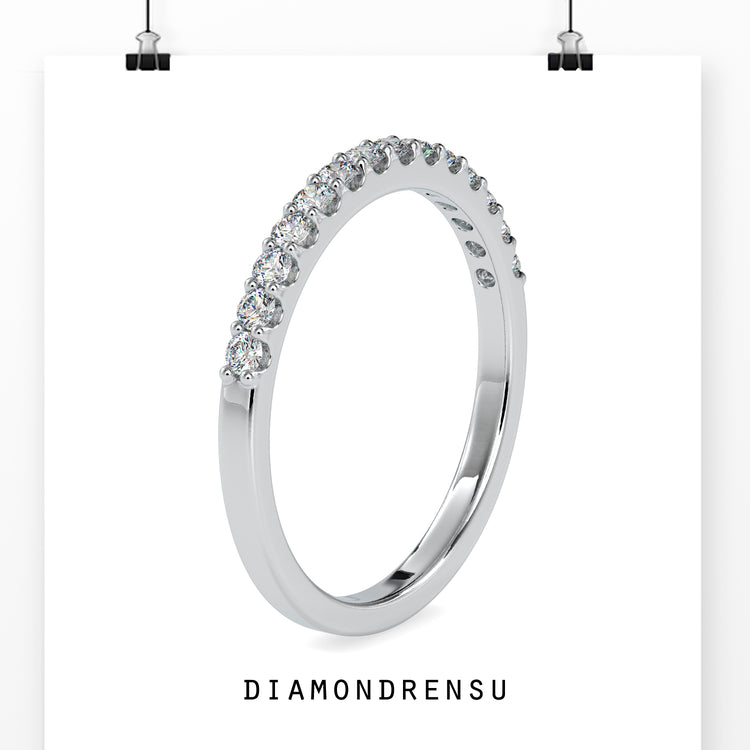 White gold half eternity band ring with round diamonds for a classic appeal.