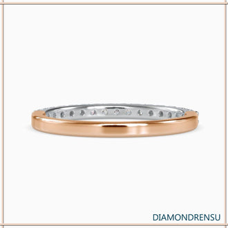 Round diamond band with lab grown diamonds in a handcrafted gold setting.