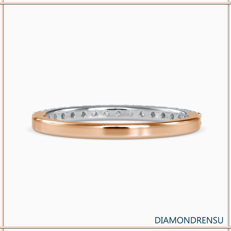 Round diamond band with lab grown diamonds in a handcrafted gold setting.