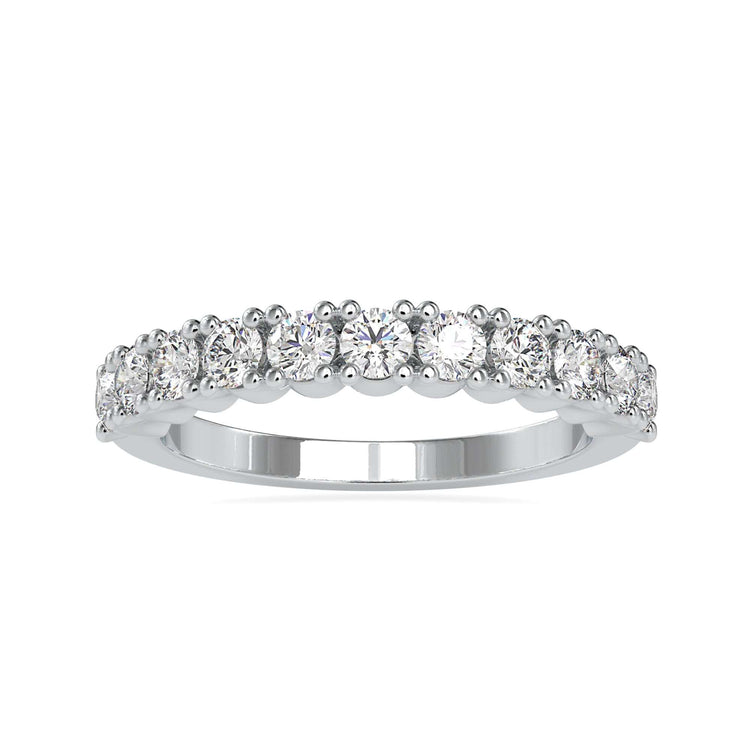 Gold wedding band with half eternity diamond band in a round prong setting.