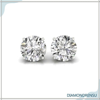 Classic gold round stud earrings featuring handmade craftsmanship for added luxury.