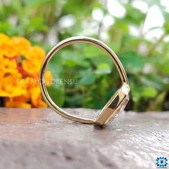 Engagement rings cushion cut style with a timeless bezel set, perfect for showcasing elegance.