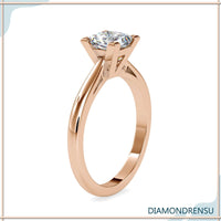 Classic 2 ct princess cut diamond ring with a cathedral setting for added brilliance.
