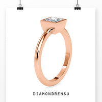 Classic bezel ring showcasing a princess cut solitaire diamond.