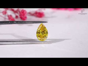 IGI certified loose yellow pear cut diamond.