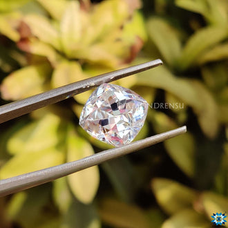 Antique cut moissanite crafted as a cushion cut loose stone for rings or pendants.