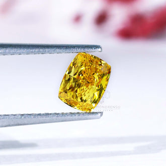 Loose elongated cushion cut yellow diamond lab grown.