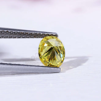 Loose oval yellow lab grown diamond certified IGI.
