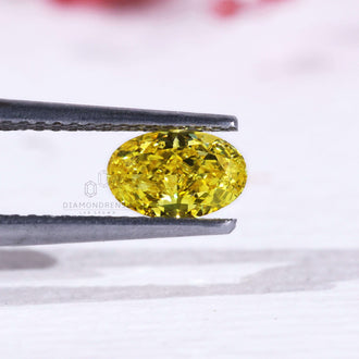 Oval cut loose diamond yellow lab grown 0.60 carat.