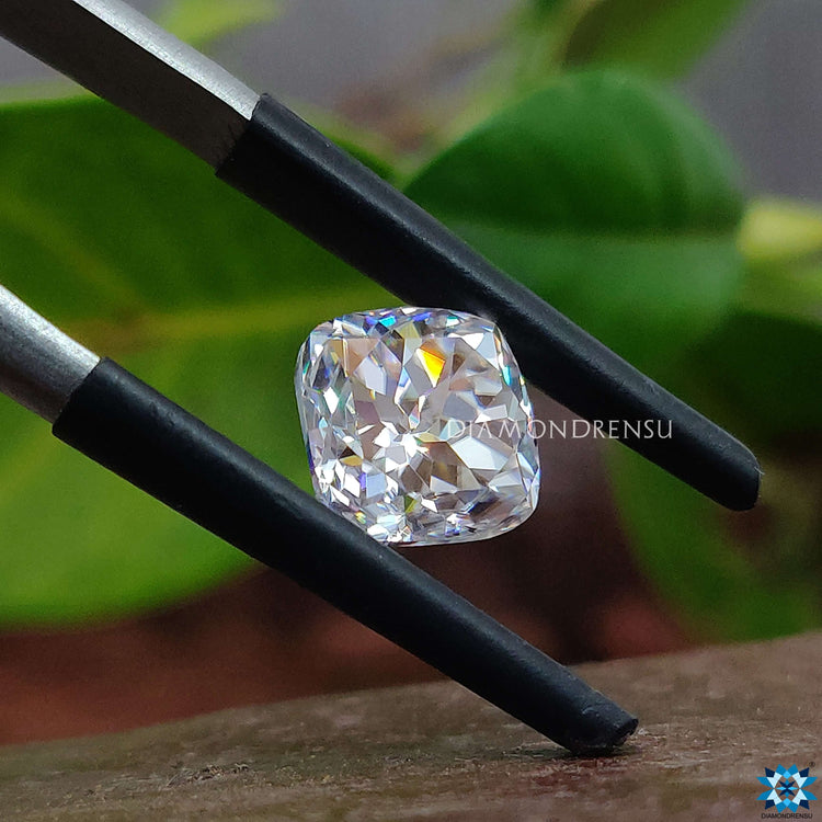 Rensu cut moissanite shown as a cushion-shaped loose stone.