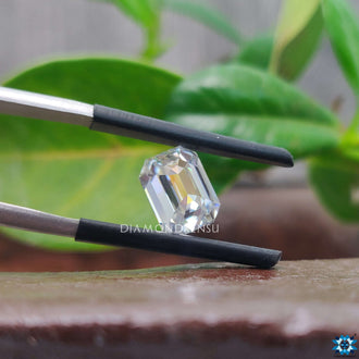 Emerald cut featured in emerald cut 2.04 carat and near colorless gray tone.