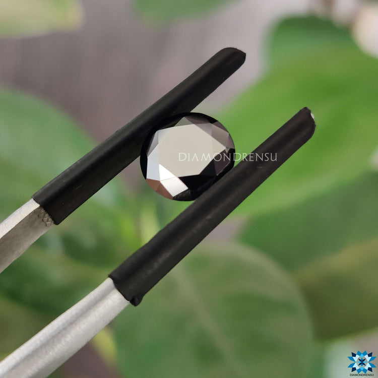 1.35 carat moissanite paired with round cut moissanite gem.