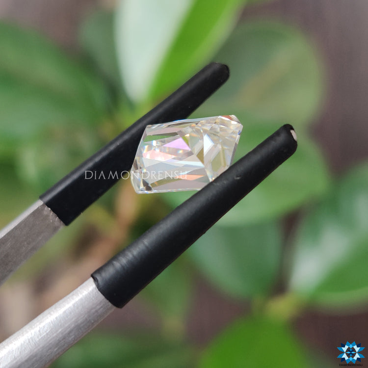 Antique cut moissanite glowing beside moissanite antique cut.