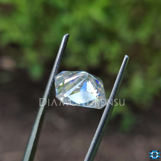 Sparkling radiant cut moissanite near moissanite stone glow.