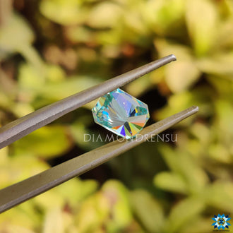 Radiant cut moissanite loose stone in blue shade with a 1.85 carat size.