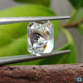 Loose Moissanite stone in Radiant Cut designed for a statement wedding band with Moissanite Radiant Cut detail.