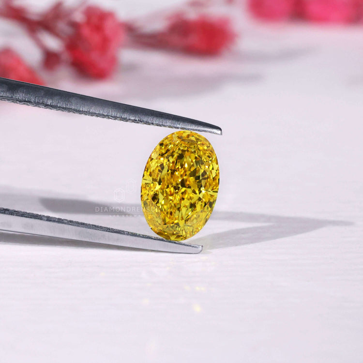 IGI certified oval shaped yellow diamond.