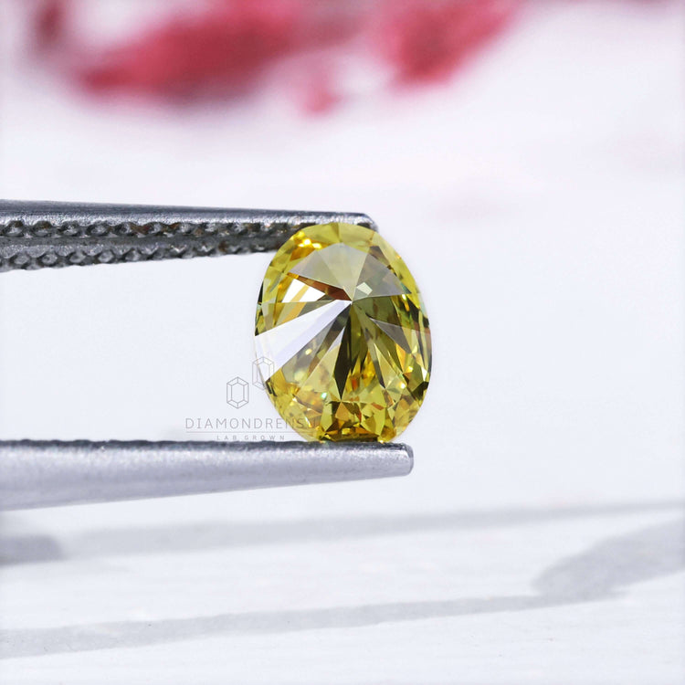 Loose lab grown diamond yellow oval cut 0.70 carat.