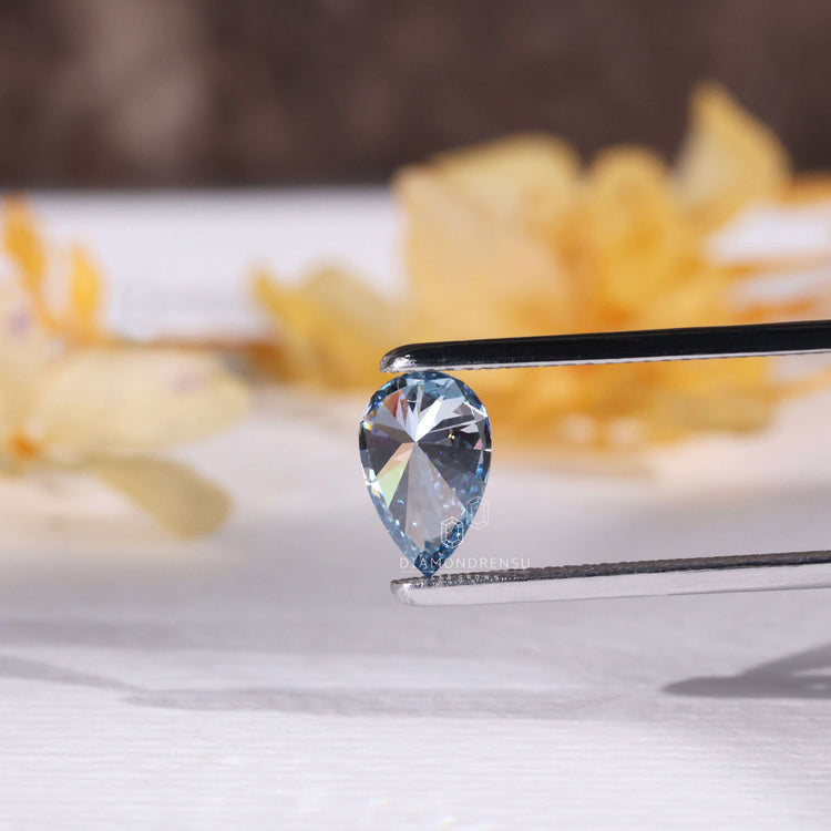 Pear cut diamond loose blue diamond.