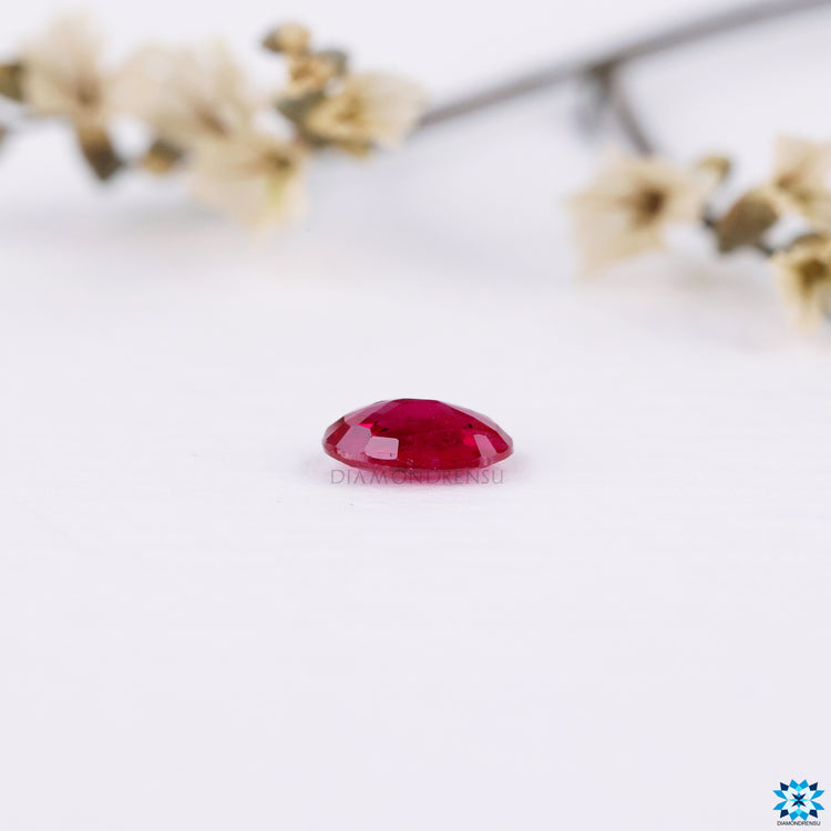 Oval gemstone shaped as oval cut ruby gemstone and july gemstone.