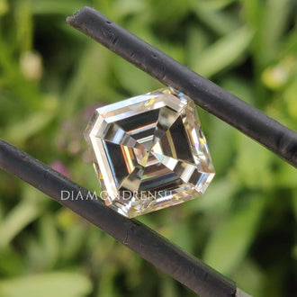 Asscher Cut Moissanite listed as a 0.69 carat moissanite loose stone.