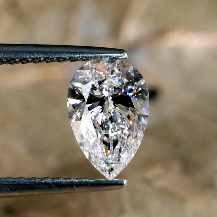 Lab grown pear diamond in 1 carat pear diamond size.