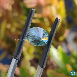 Oval cyan blue moissanite listed as 2.25 carat moissanite and loose moissanite.