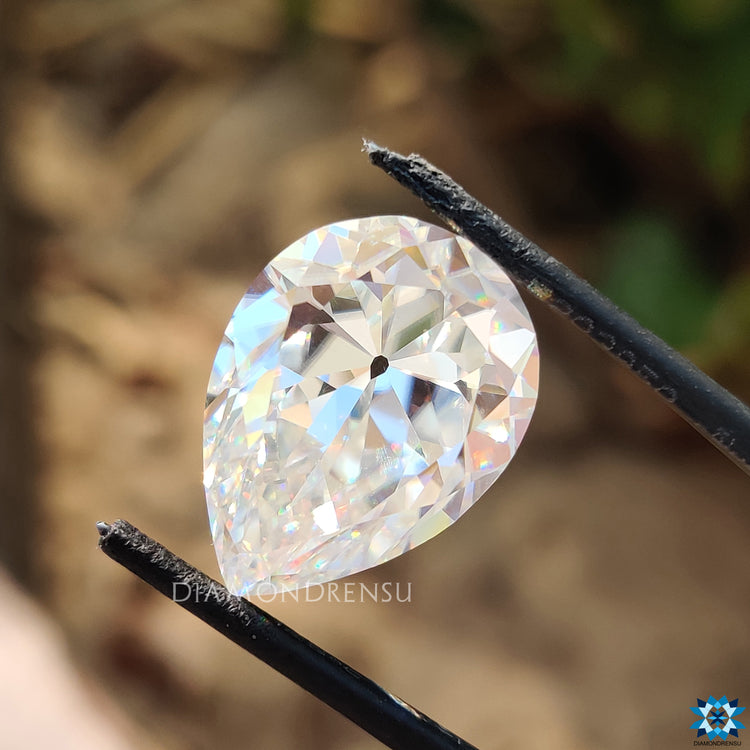 Moissanite loose stones shown in old European cut and pear cut options from Diamondresnu.