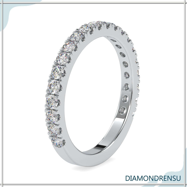 IGI certified semi eternity band with rounded diamonds and a pave wedding band design.