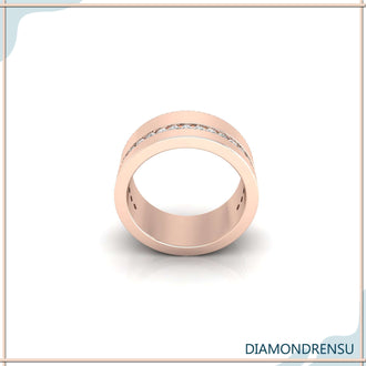 Gold wedding band for men with round diamonds and elegant shine.