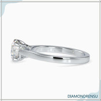 2 carat round cut diamond ring in an elegant 4 prong setting.