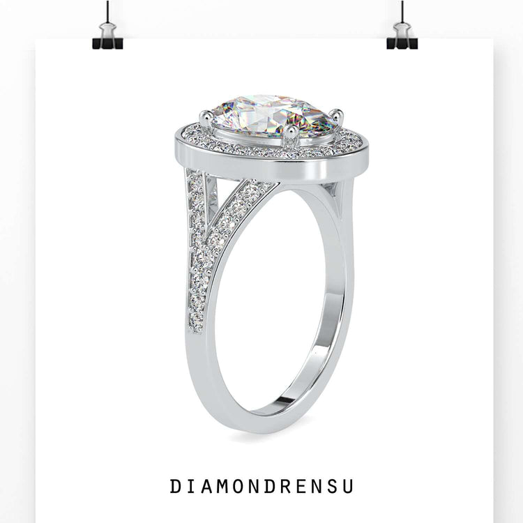 Halo diamond ring featuring an oval diamond in 4 prong engagement ring