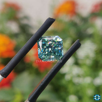 Loose moissanite available as radiant cut and cyan blue moissanite.