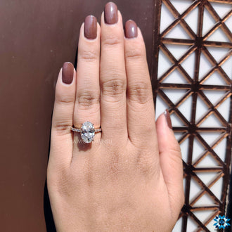 Round Cut Side Stones oval ring with hidden halo Cathedral Setting