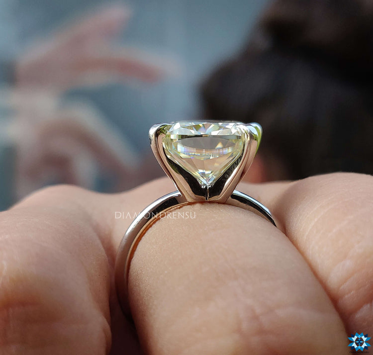 Cushion Cut Moissanite Engagement Ring radiating charm and brilliance.