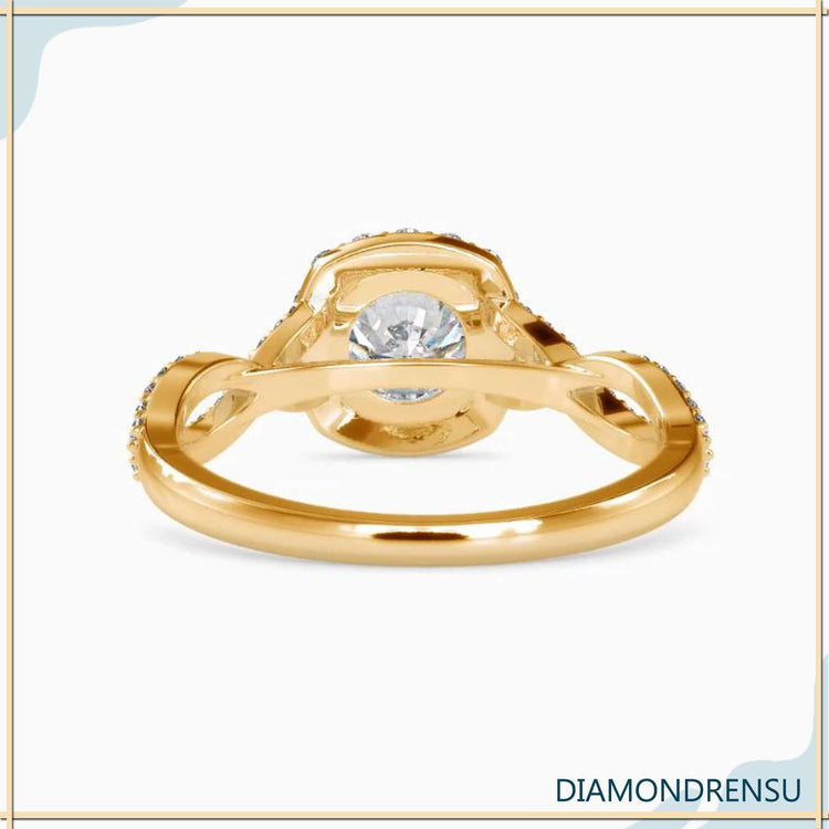 Pave band engagement ring with a twisted diamond setting.