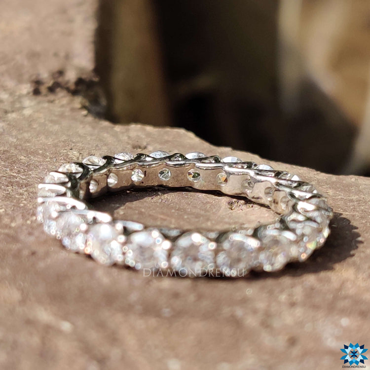 Round cut eternity band perfect for wedding or anniversary gifts.