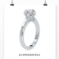 Bridge engagement ring with elegant diamond accents.