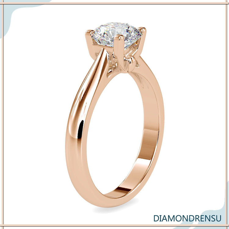 4 prong solitaire engagement ring with a classic and elegant design.