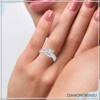 A radiant moissanite ring crafted with a cathedral setting engagement ring design in rose gold.