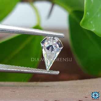 Unique cut Moissanite from Diamondrensu shaped as Spear Cut for bold fashion rings.