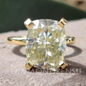 Elongated cushion cut ring with a timeless design for modern elegance.