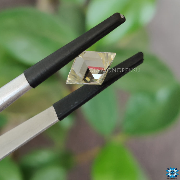 Off white moissanite shining with moissanite antique cut facets.