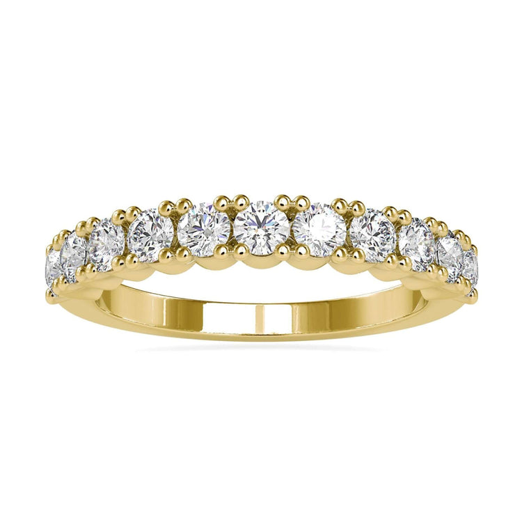 Half eternity band ring with round cut shared prong diamonds.