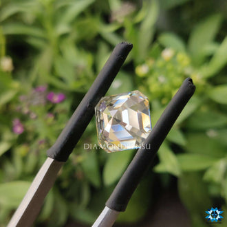 Asscher cut available in off white moissanite with clean symmetry.