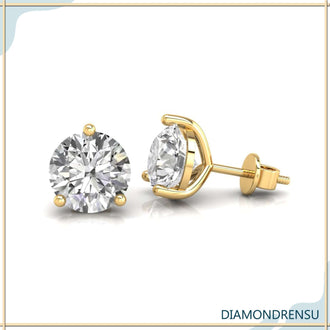 Brilliant round diamond earrings with a martini setting, designed for elegant simplicity.