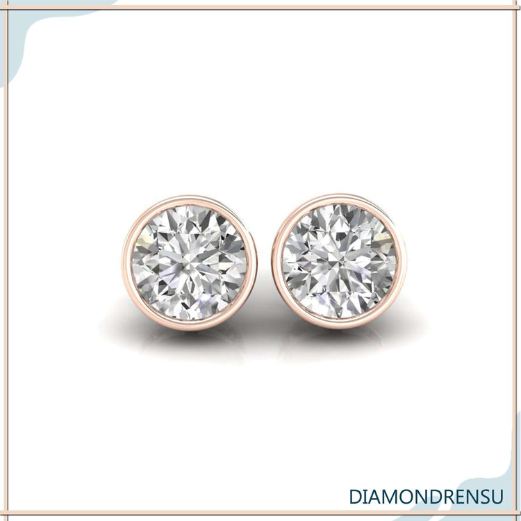 Stunning round gold earrings studs, featuring bezel set earrings for a secure fit.