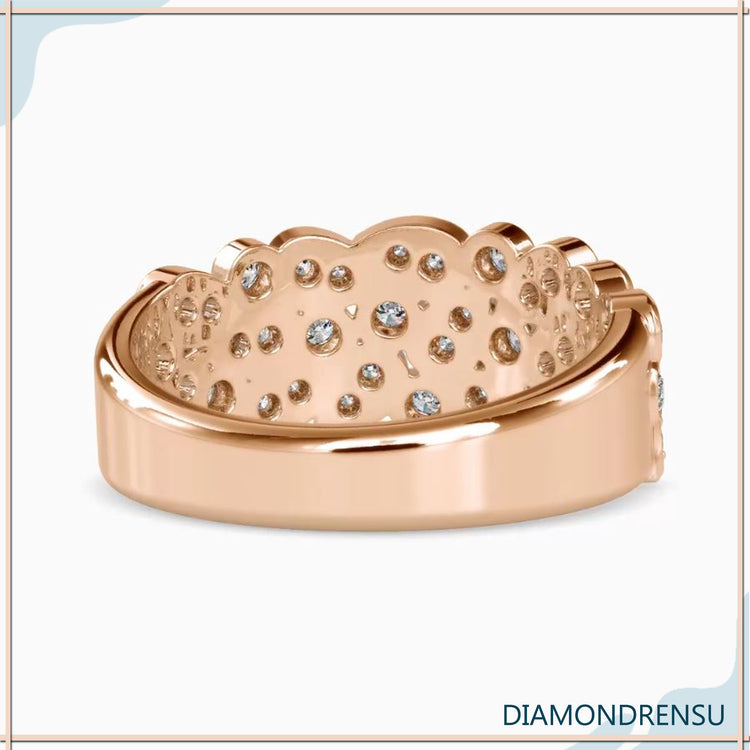 Handmade jewelry wedding band with bezel set diamonds in a unique diamond ring design.