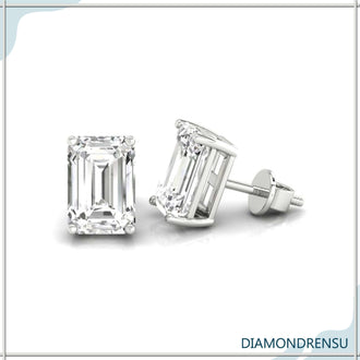 Emerald and diamond earrings with a stunning emerald cut design, perfect for formal occasions.